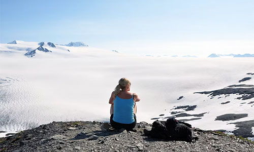 Woman near glacier